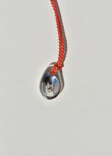 Sea Stone Pendant on Coral Silk Cord