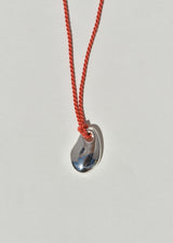 Sea Stone Pendant on Coral Silk Cord